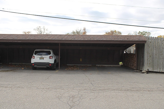 view of car parking with a carport