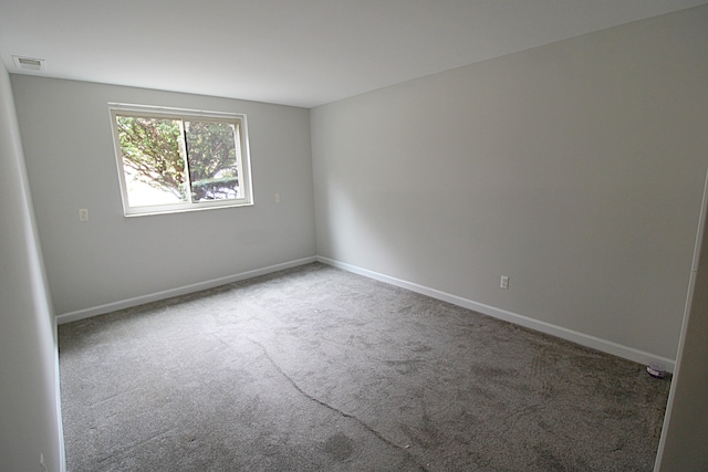 view of carpeted spare room