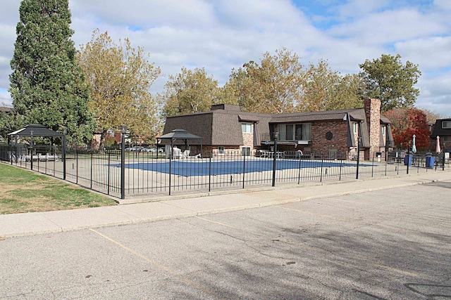 view of swimming pool with a gazebo