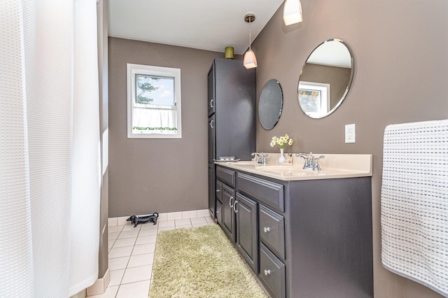 bathroom with vanity and tile patterned floors