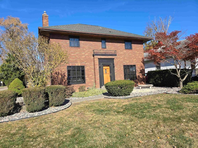 view of property with a front lawn