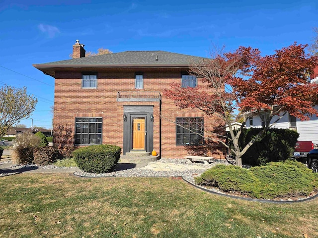 view of front facade featuring a front yard