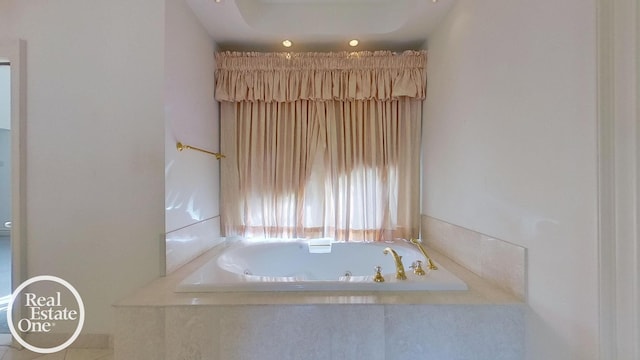 bathroom featuring tiled bath