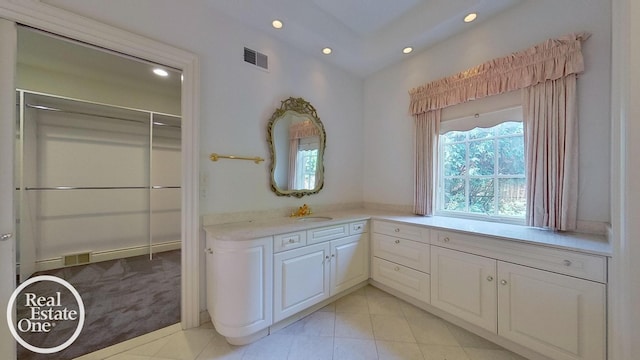 bathroom featuring vanity and tile patterned floors