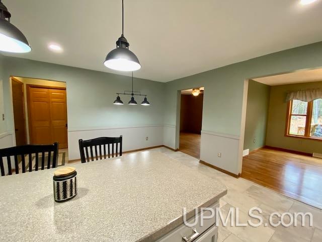 dining area featuring light hardwood / wood-style floors