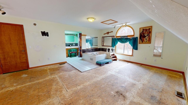 interior space featuring lofted ceiling