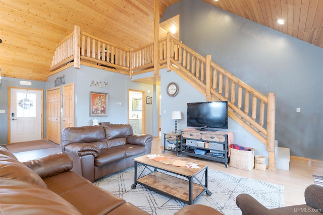 living room featuring wooden ceiling, light hardwood / wood-style floors, and high vaulted ceiling