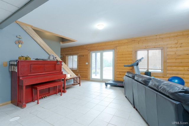 living room featuring log walls