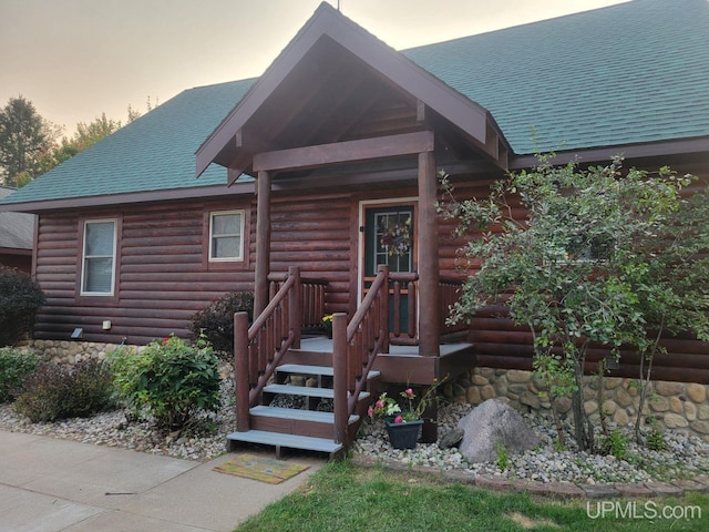 371 Morrison Creek Rd, Iron River, MI 49935 - view of front of property with stone siding and roof with shingles