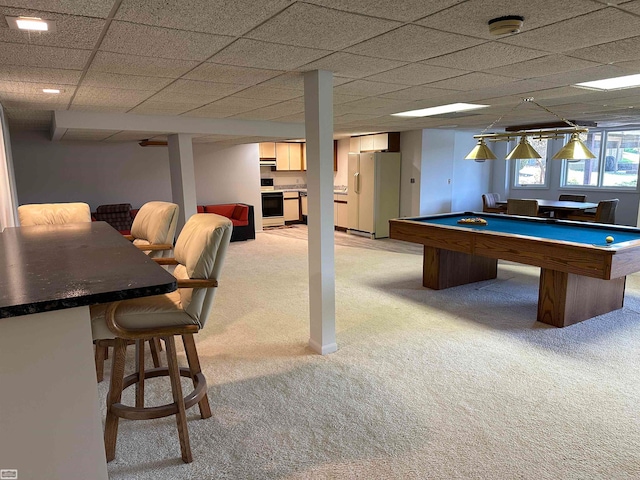 recreation room featuring a drop ceiling, pool table, and light carpet