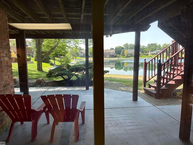 view of patio / terrace featuring a water view