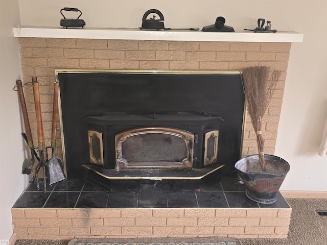 interior details featuring a wood stove