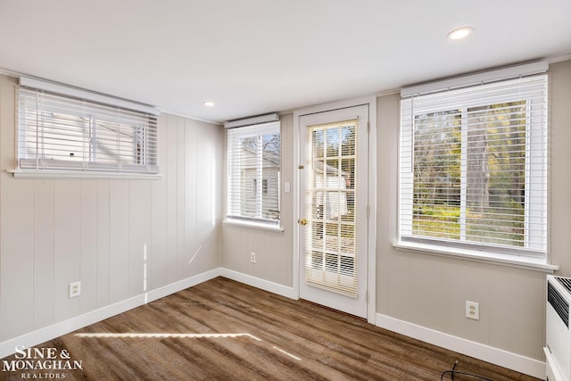 doorway featuring wood-type flooring