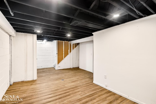 basement with light wood-type flooring