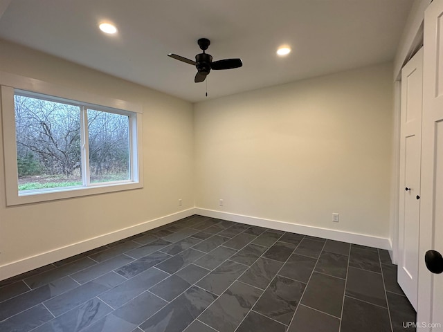 spare room featuring ceiling fan