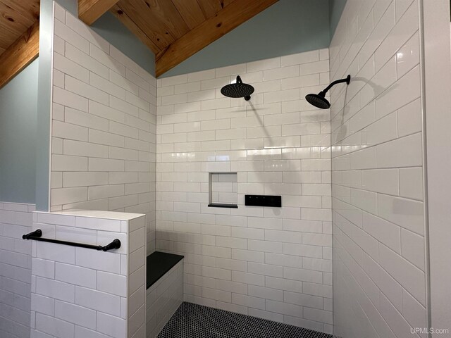 11881 N Junet Rd, Ironwood, MI 49938 - bathroom with wooden ceiling, vaulted ceiling, and a tile shower