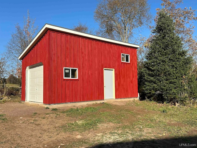 view of outdoor structure featuring a garage