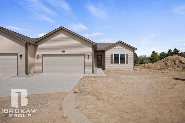 3371 Meadowridge Ct Unit 107, Davison, MI 48423 - single story home featuring an attached garage, driveway, and roof with shingles