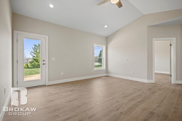 unfurnished room with lofted ceiling, ceiling fan, baseboards, recessed lighting, and light wood finished floors