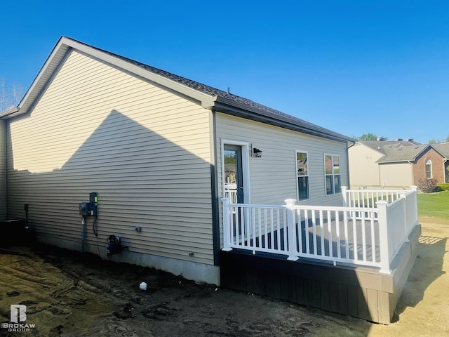 3371 Meadowridge Ct Unit 107, Davison, MI 48423 - back of house featuring a deck