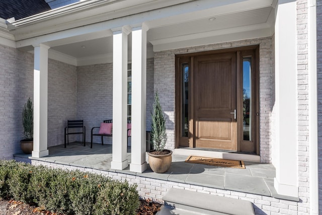 entrance to property with covered porch