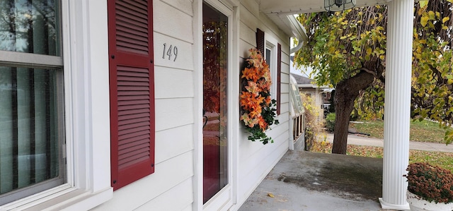 view of exterior entry featuring a garage