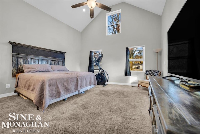 carpeted bedroom with high vaulted ceiling and ceiling fan