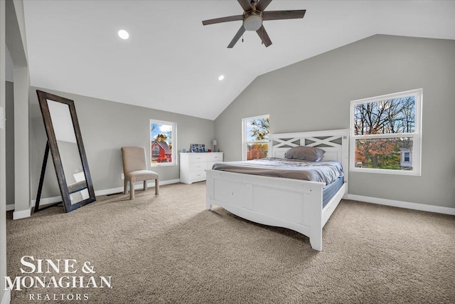 bedroom with carpet, ceiling fan, and vaulted ceiling