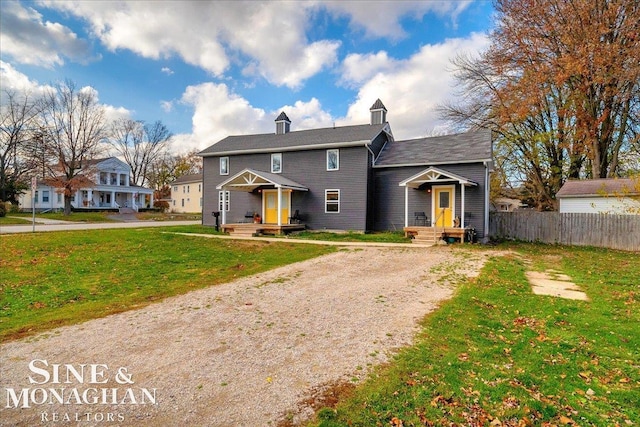 view of property with a front lawn