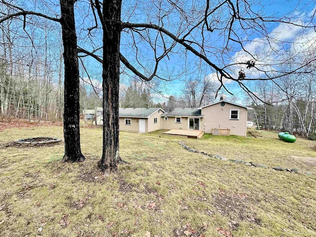 view of yard with a deck