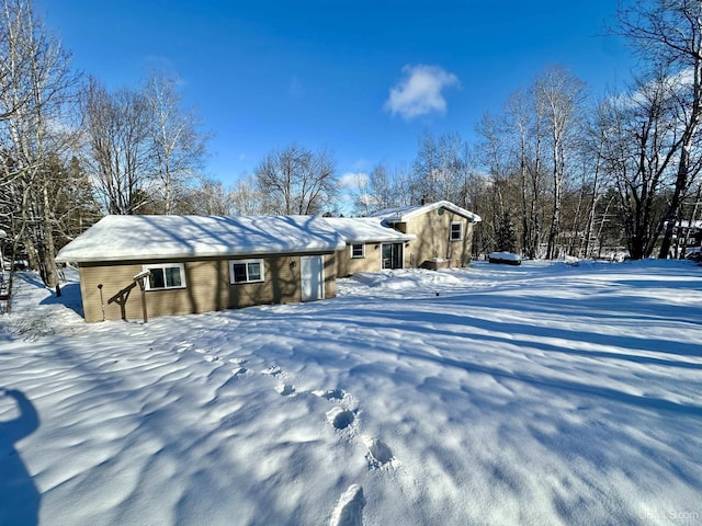 view of snow covered property