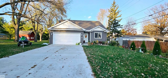 view of front of house with a garage and a front yard