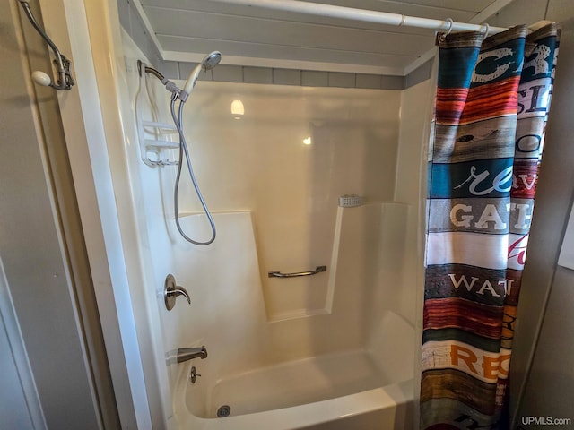 full bath with shower / bath combination with curtain