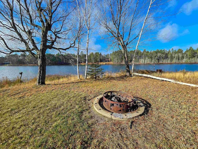 view of water feature featuring a fire pit