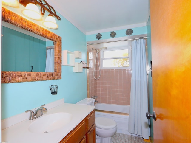 full bathroom featuring tile patterned flooring, vanity, toilet, and shower / tub combo with curtain