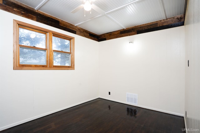 spare room featuring hardwood / wood-style flooring and ceiling fan