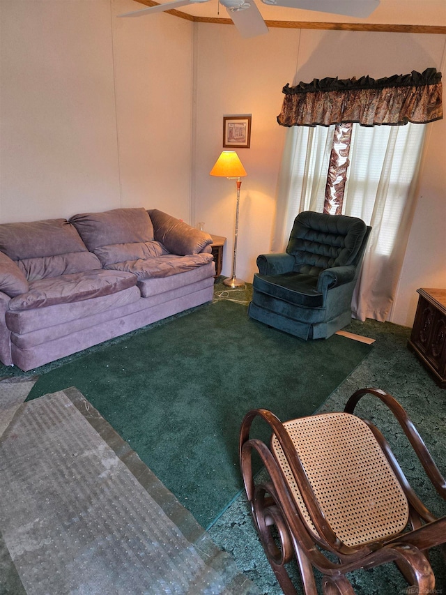 carpeted living room with ceiling fan