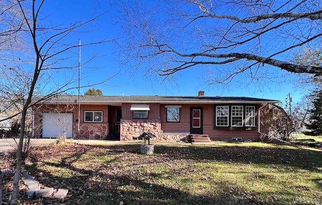 single story home featuring a garage and a front yard