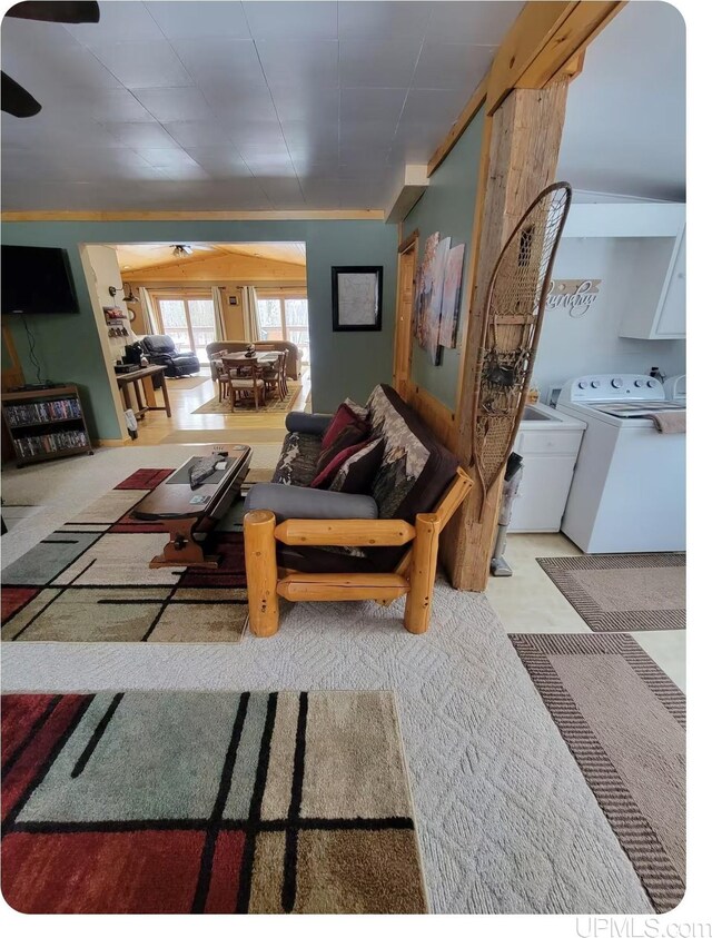 carpeted living room featuring crown molding