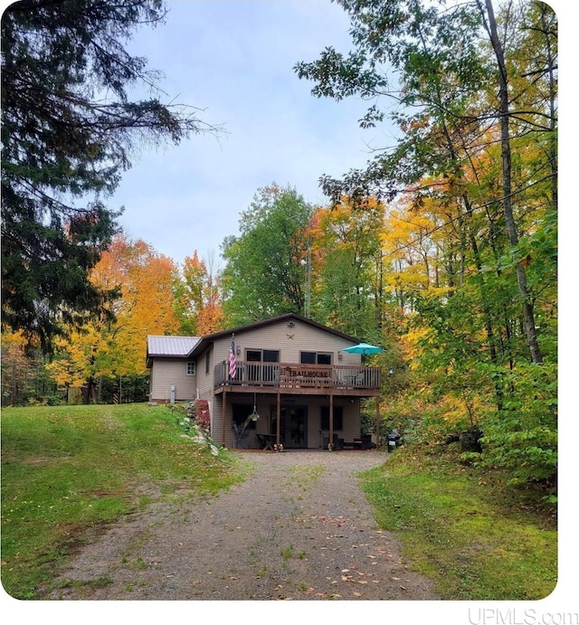 view of front of house with a deck