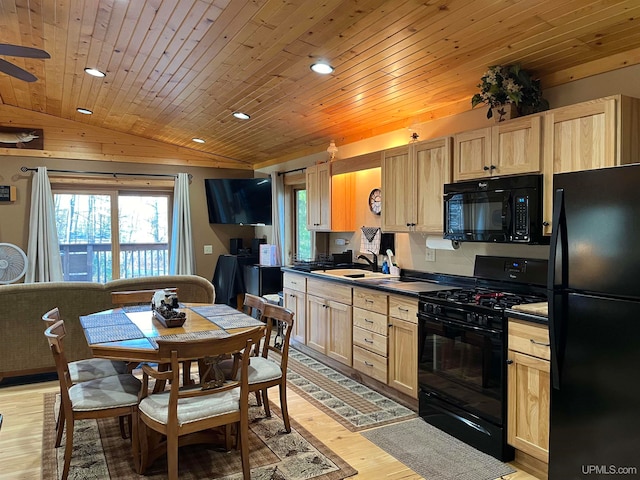 kitchen with lofted ceiling, black appliances, sink, wooden ceiling, and light wood-type flooring