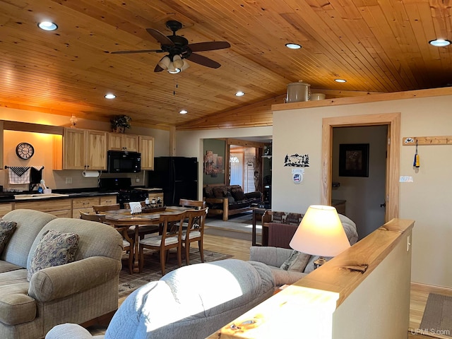 living room with lofted ceiling, hardwood / wood-style floors, wooden ceiling, and ceiling fan