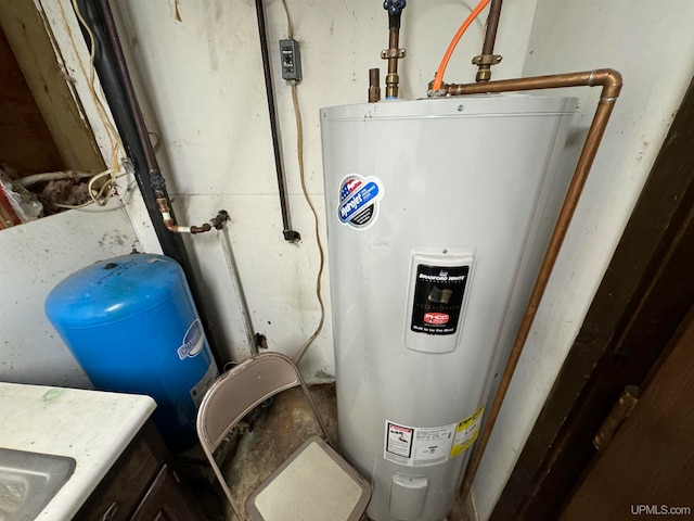 utility room featuring water heater