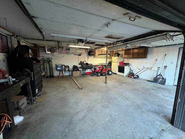 garage with white refrigerator