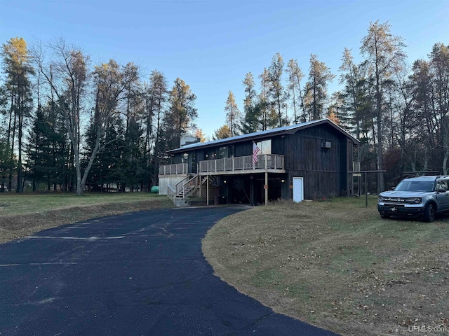 view of front of house featuring a deck