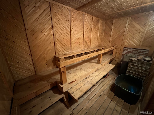 view of sauna / steam room with wooden walls