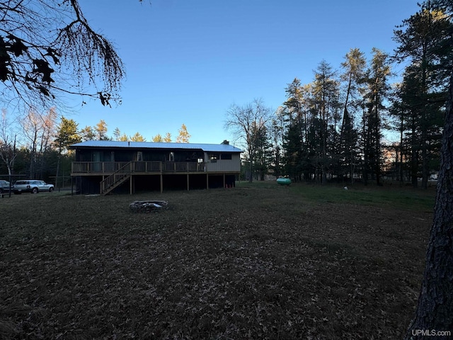 view of yard with a wooden deck