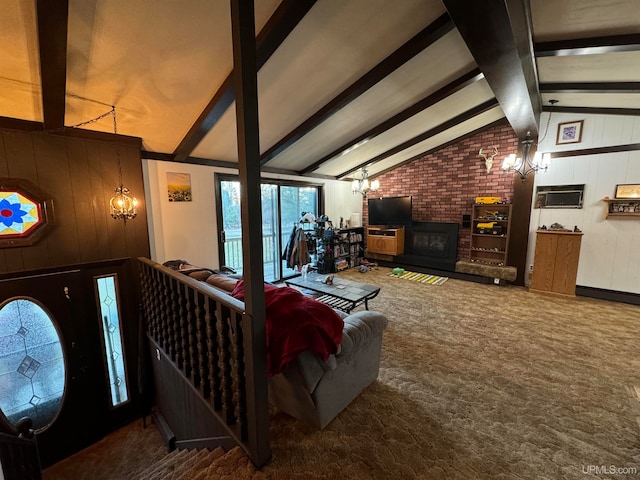 carpeted living room with a fireplace, wooden walls, and vaulted ceiling with beams