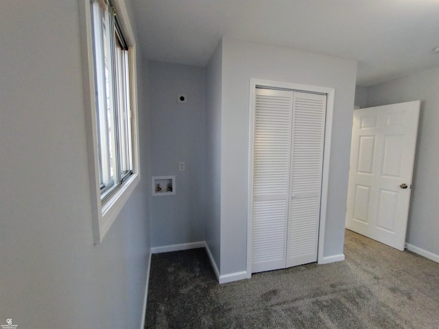 unfurnished bedroom with a closet and carpet flooring