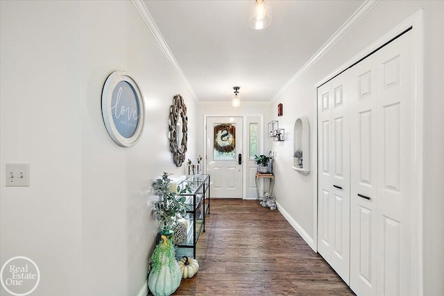 interior space with dark hardwood / wood-style flooring and ornamental molding